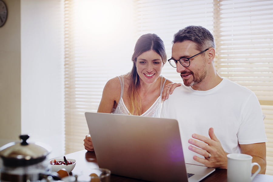 shot-of-a-mature-couple-using-a-laptop-together